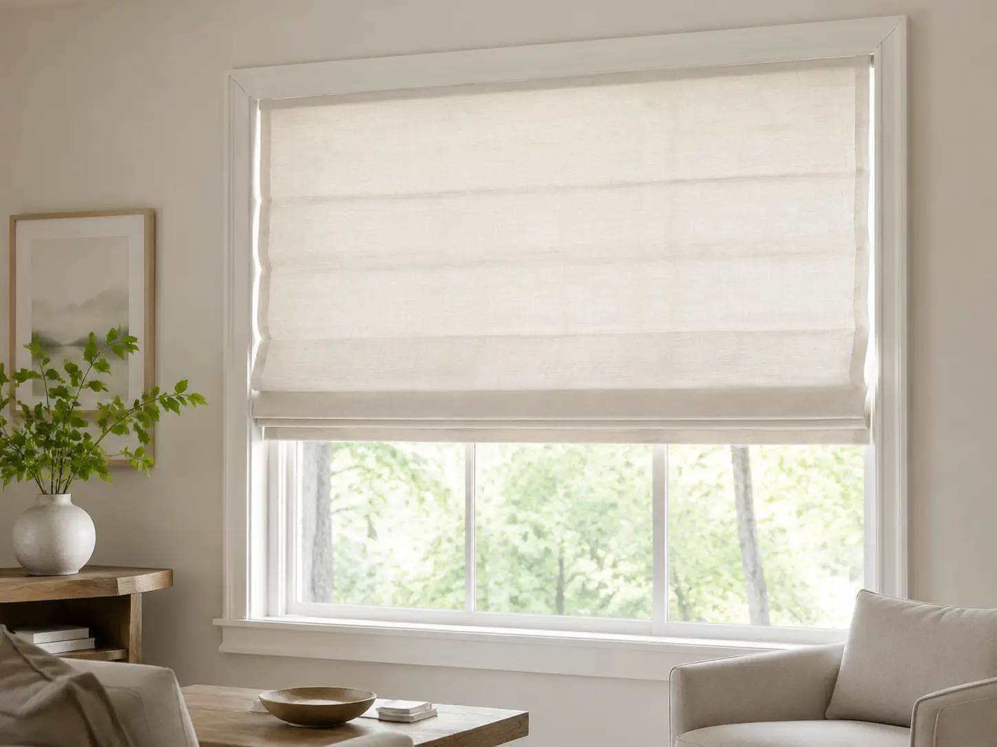 Tailored ivory Roman shade in a softly lit modern living room